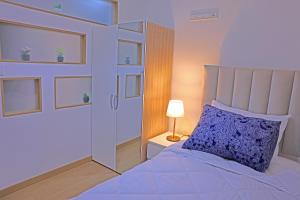 Postel nebo postele na pokoji v ubytování Hotel La Casa Blanca