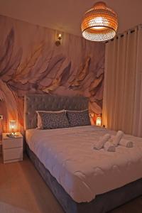 Postel nebo postele na pokoji v ubytování Hotel La Casa Blanca