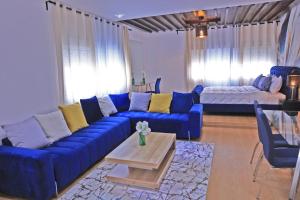 Postel nebo postele na pokoji v ubytování Hotel La Casa Blanca