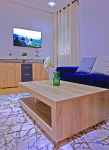 TV a/nebo společenská místnost v ubytování Hotel La Casa Blanca