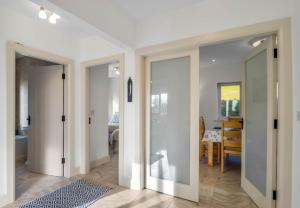Кровать или кровати в номере Teach Eile, Clifden