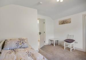 Кровать или кровати в номере Teach Eile, Clifden