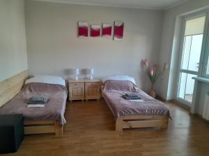 Pokoje Bory Tucholskie客房内的一张或多张床位