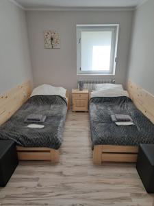 Pokoje Bory Tucholskie客房内的一张或多张床位