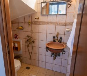 Kúpeľňa v ubytovaní Chara's Residence