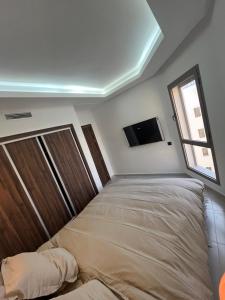 Una cama o camas en una habitación de Surf & Sea Vista