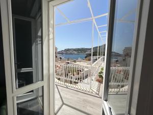 a view of the ocean from a balcony at B&B Ponza Suite in Ponza