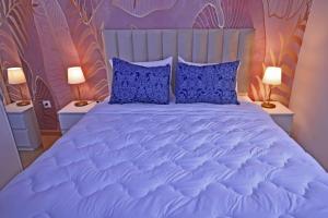 Postel nebo postele na pokoji v ubytování Hotel La Casa Blanca