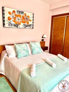 a bedroom with two beds with towels on them at HOTEL EL MOLINO DE PANCORBO in Pancorbo
