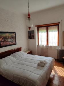 Katil atau katil-katil dalam bilik di Casale Bambù - Hidden Countryhouse