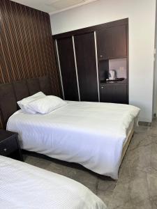 Rúm í herbergi á Mount of Olives Hotel