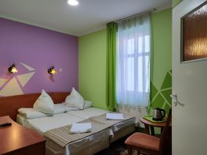 Postel nebo postele na pokoji v ubytování Mieszko centrum przy deptaku
