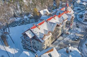an aerial view of a building covered in snow at DW Mieszko in Karpacz