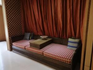 En eller flere senge i et værelse på Shanshuiyue Hotel