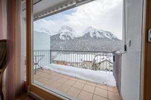 Nespecifikovaný výhled na hory nebo výhled na hory při pohledu z apartmánu
