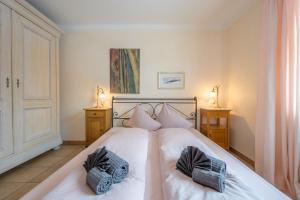Postel nebo postele na pokoji v ubytování Palazzi Pratour