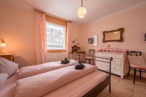 Postel nebo postele na pokoji v ubytování Palazzi Pratour