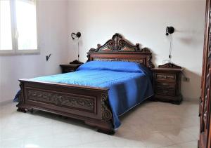 Un pat sau paturi într-o cameră la villa bel vedere by salentolimit