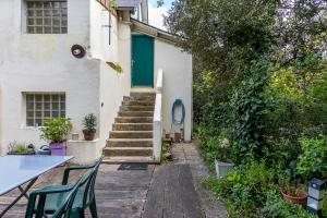 Κήπος έξω από το Pieds dans l'eau à Plage des Dames