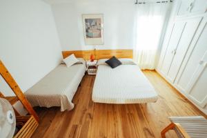 Posteľ alebo postele v izbe v ubytovaní Apartamento HORIZON PARADISE - Primera linea de playa