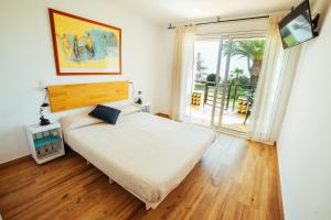 Posteľ alebo postele v izbe v ubytovaní Apartamento HORIZON PARADISE - Primera linea de playa