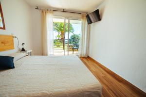 Posteľ alebo postele v izbe v ubytovaní Apartamento HORIZON PARADISE - Primera linea de playa + 28 fotografií