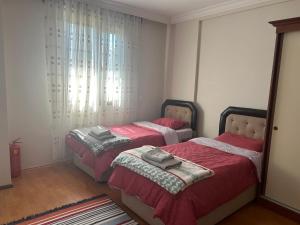 Postel nebo postele na pokoji v ubytování Denize 200 metre, 3+1 Bahçeli Villa