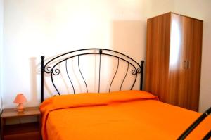 En eller flere senge i et værelse på Ll43 Casa vacanze Tanoshii