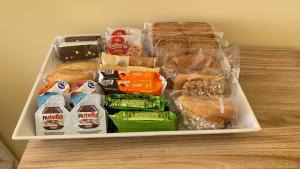 a refrigerator filled with different types of food at villa verde sul mare in Vietri sul Mare