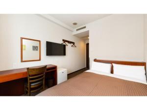 The One Five Marine Fukuoka - Vacation STAY 40105v tesisinde bir odada yatak veya yataklar