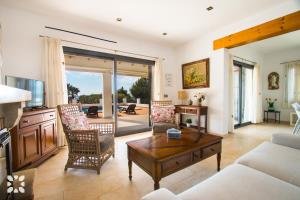 A bed or beds in a room at Villa Sapphire by Abahana Villas