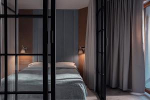 Ένα ή περισσότερα κρεβάτια σε δωμάτιο στο Apartamenty In - Prywatne Apartamenty - Maloves Władysławowo
