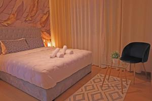 Postel nebo postele na pokoji v ubytování Hotel La Casa Blanca