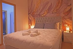 Postel nebo postele na pokoji v ubytování Hotel La Casa Blanca
