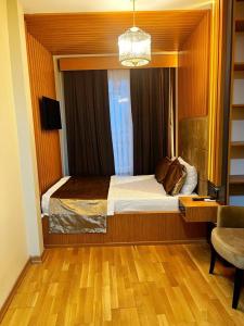 Taksim Cetinkaya Suiteにあるベッド