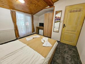 Postel nebo postele na pokoji v ubytování Guest Rooms- KLEPALSKI House