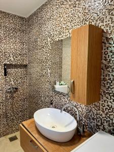 Koupelna v ubytování Villa Arisi