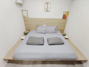 Nap Hella Inn客房内的一张或多张床位