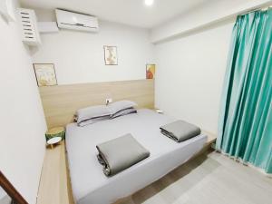 Nap Hella Inn客房内的一张或多张床位