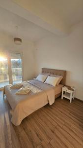 Una cama o camas en una habitación de Apartments Radoman