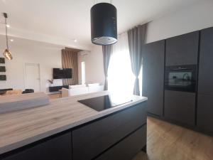 Kuchyň nebo kuchyňský kout v ubytování Villa Kora - luxury holiday Apartments