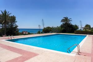 Bazén v ubytovaní Apartamento HORIZON PARADISE - Primera linea de playa alebo v jeho blízkosti