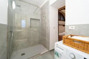 Kúpeľňa v ubytovaní Ortigia Vicolo Giudecca Flat