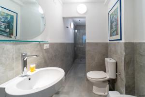 Kúpeľňa v ubytovaní Ortigia Vicolo Giudecca Flat