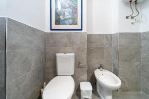 Kúpeľňa v ubytovaní Ortigia Vicolo Giudecca Flat