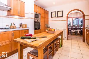 A kitchen or kitchenette at Villa Sandro by Abahana Villas