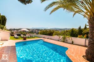The swimming pool at or close to Villa Sandro by Abahana Villas