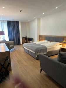 Katil atau katil-katil dalam bilik di Hotel Homey Kobuleti