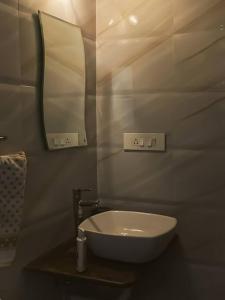 Ванная комната в The Serene Serviced Studio Apartment Colva
