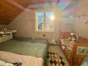 En eller flere senge i et værelse på Maison avec piscine 14 personnes + 34 billeder